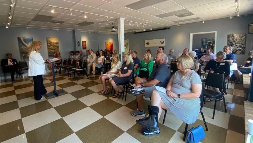 Photo of YCCF board members, representatives from nonprofits and scholarship recipients gathered at the Yadkin Arts Council.