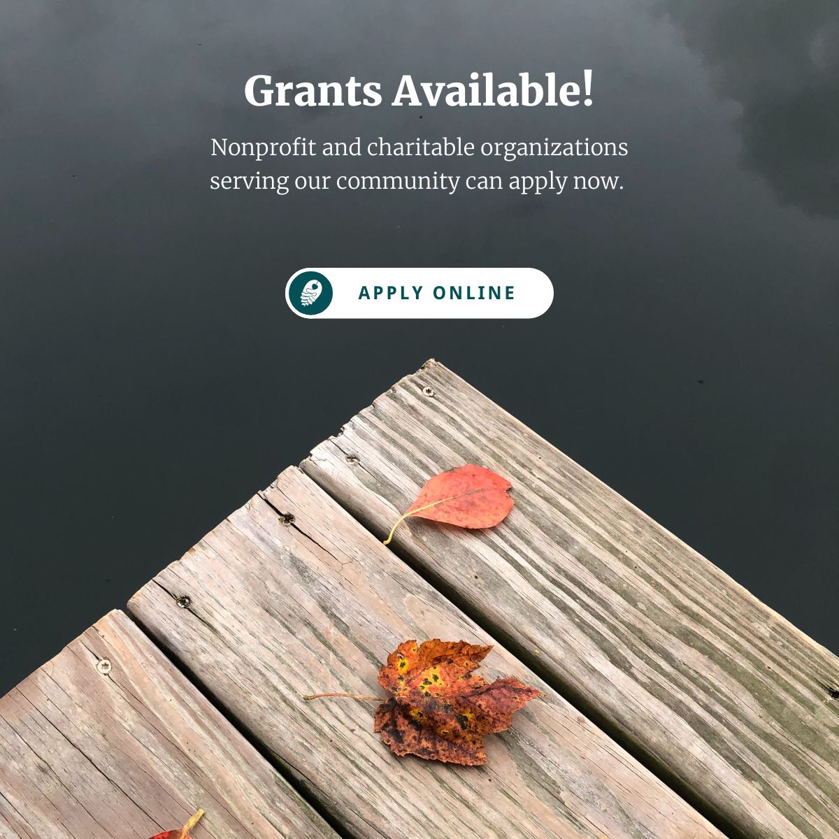 Photograph of fall leaves on a doc above Lake Lure with text that reads Grants Available! Nonprofit and charitable organizations serving our community can apply now. Apply online!