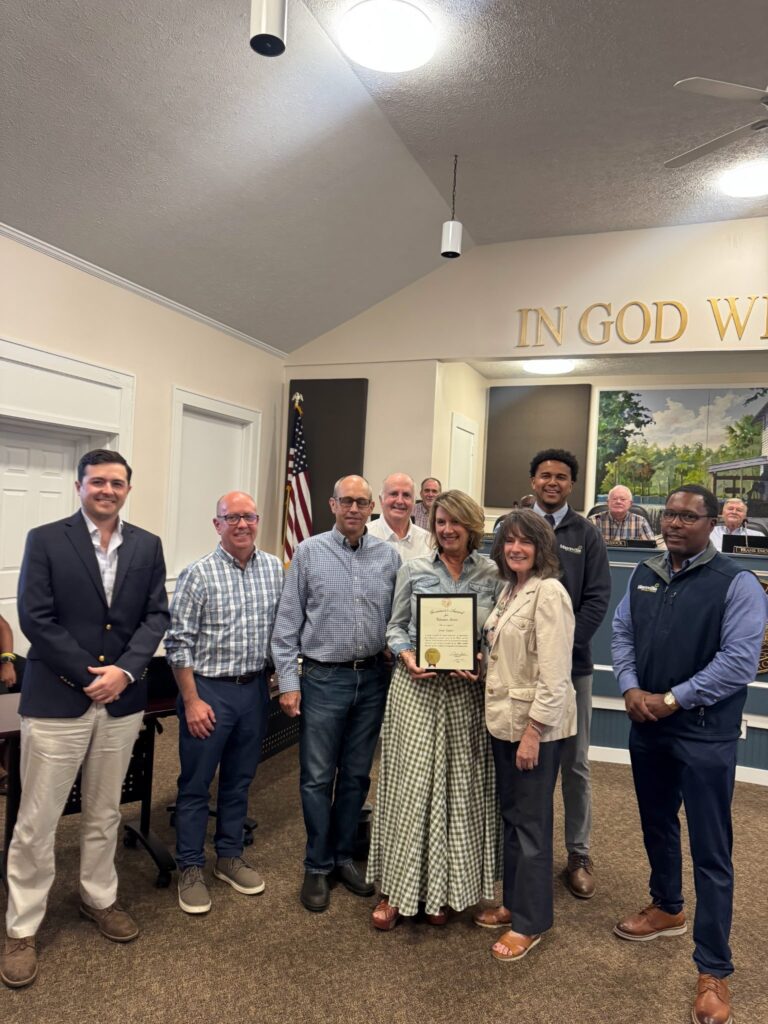 Pictured from Left to Right: Blake Bachelor, Vice President JCCF, Charley Jones, Grants Chair JCCF, John Taylor, Joan's Husband, Dan Ryan, President JCCF, Joan Taylor, Awardee and Past President JCCF, Wendy Winslow, Past President JCCF, Demetrius Jones, Board Member JCCF and Schumata Brown, Board Member JCCF.