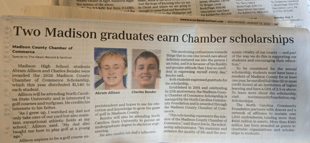 Photograph of a newspaper clipping with headline "Two Madison graduates earn Chamber scholarships" written by the Madison County Chamber of Commerce and published in the News-Record & Sentinel